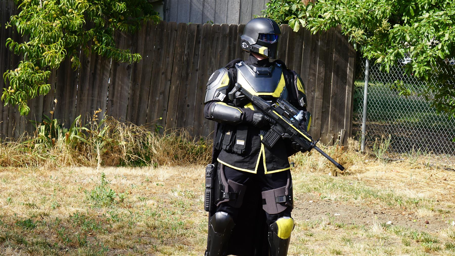 Helldivers B-01 armor test-fit photo outdoors with rifle prop.