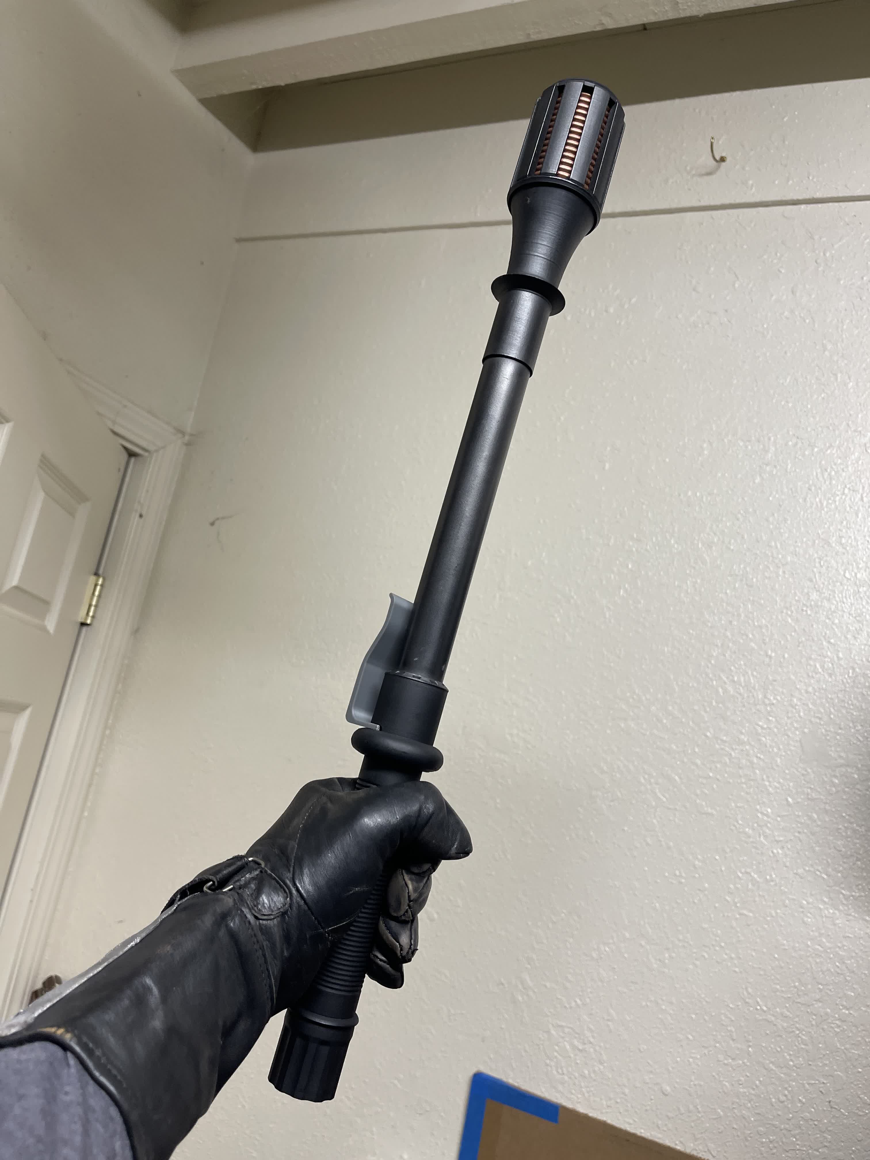 Another angle of the Metrocop stunstick prop with dark finish.